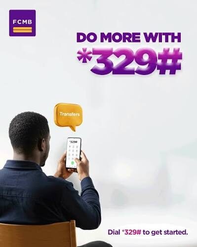 Illustration of a Nigerian using FCMB USSD code *329# on a mobile phone.