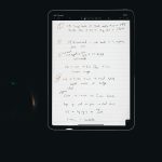iPad screen displaying handwritten project notes and Apple Pencil shortcuts for organized digital planning.