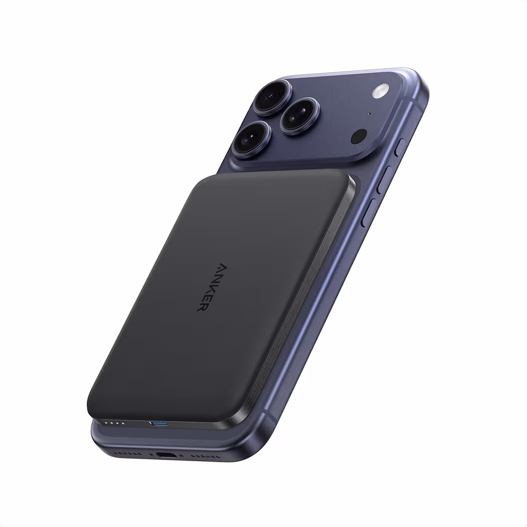 Ultra-thin 5000mAh magnetic portable charger attached seamlessly to the back of a modern smartphone