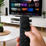 Person holding a Fire TV Stick style remote that is not responding